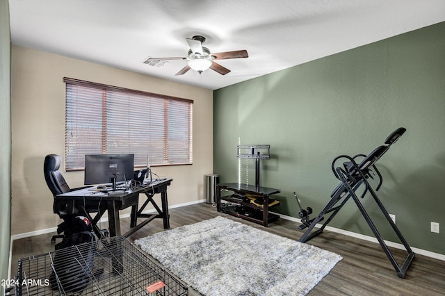 office area featuring ceiling fan and dark wood-type flooring