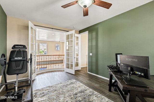 office space featuring french doors, ceiling fan, and dark wood-type flooring