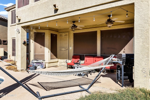 view of patio with ceiling fan