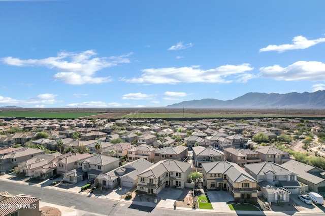 birds eye view of property featuring a mountain view