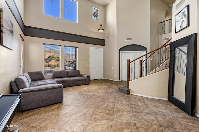 foyer with a towering ceiling