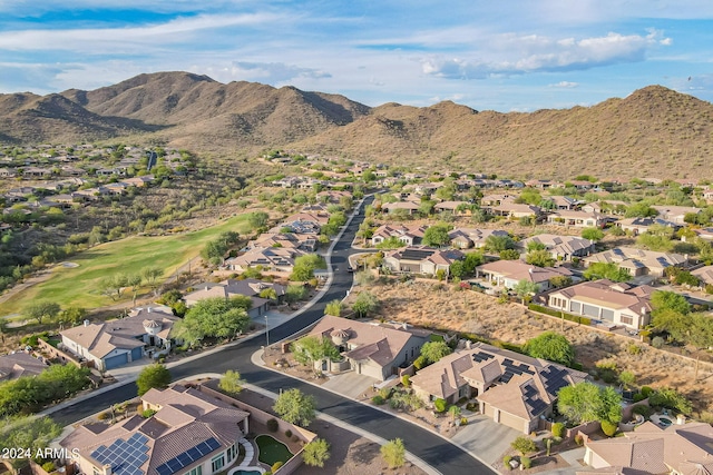 birds eye view of property featuring a mountain view