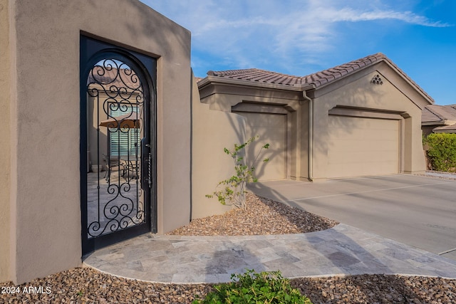 entrance to property with a garage