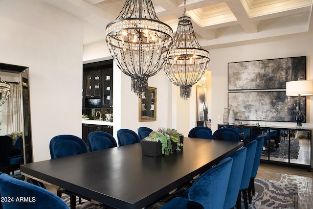 dining area with beamed ceiling, an inviting chandelier, hardwood / wood-style floors, and coffered ceiling