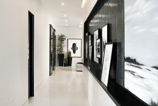 hallway with light tile floors