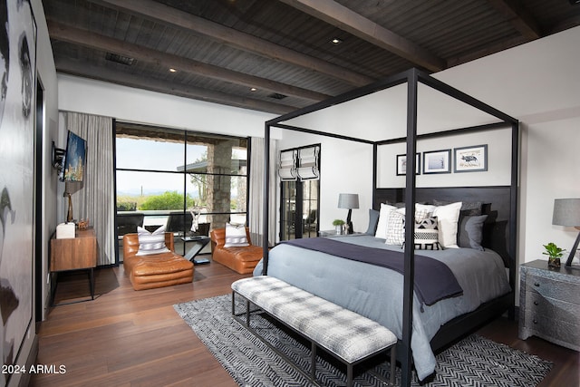 bedroom with wooden ceiling, beam ceiling, and dark wood-type flooring