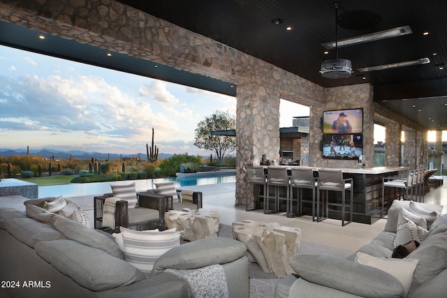 view of patio featuring an outdoor bar and outdoor lounge area