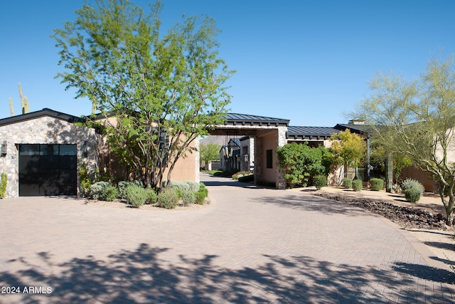 view of front of home with a garage