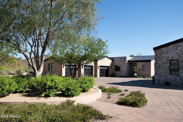 view of front of home with a garage