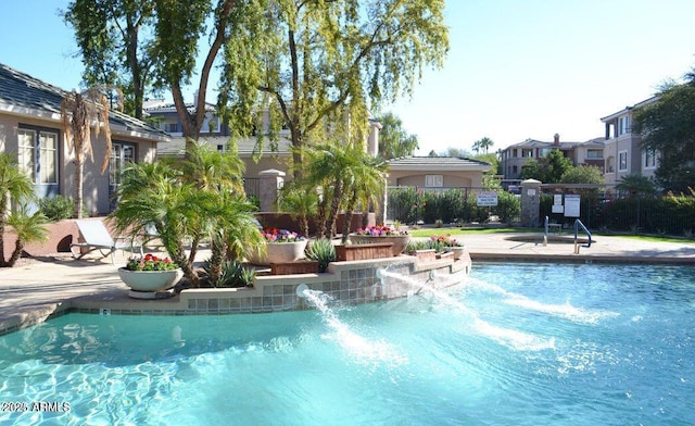 5345 E Van Buren St Unit 370, Phoenix, AZ 85008 - community pool with a patio area and a residential view