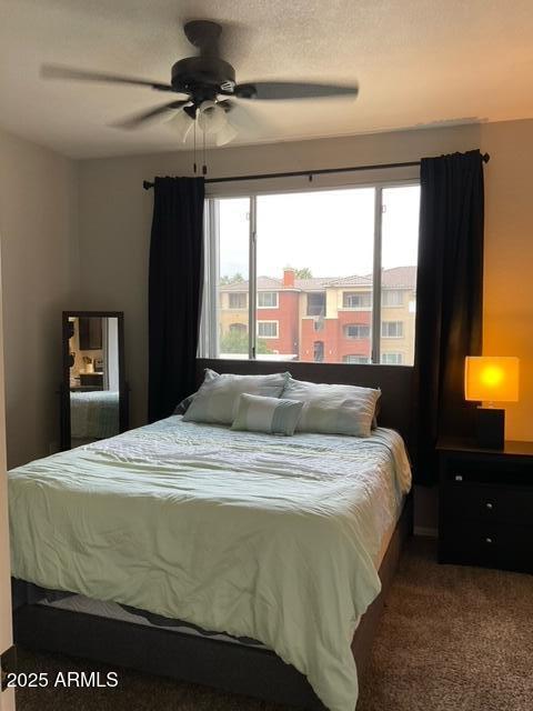 5345 E Van Buren St Unit 370, Phoenix, AZ 85008 - bedroom featuring carpet and ceiling fan