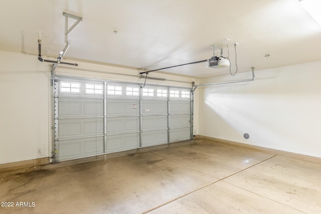 garage featuring a garage door opener