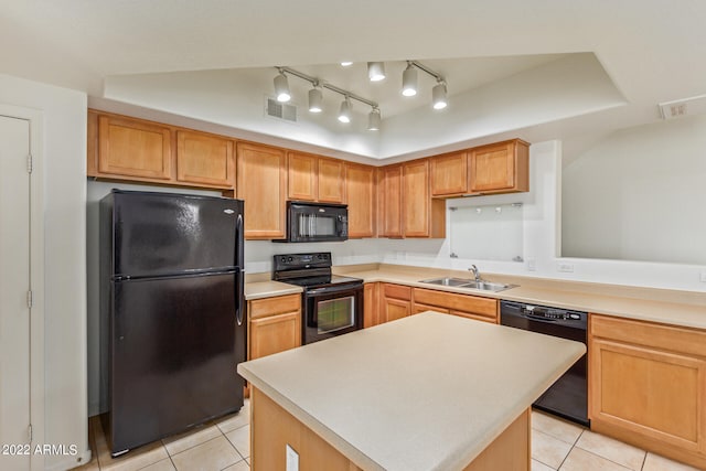 kitchen with a kitchen island, black appliances, sink, and light tile patterned floors