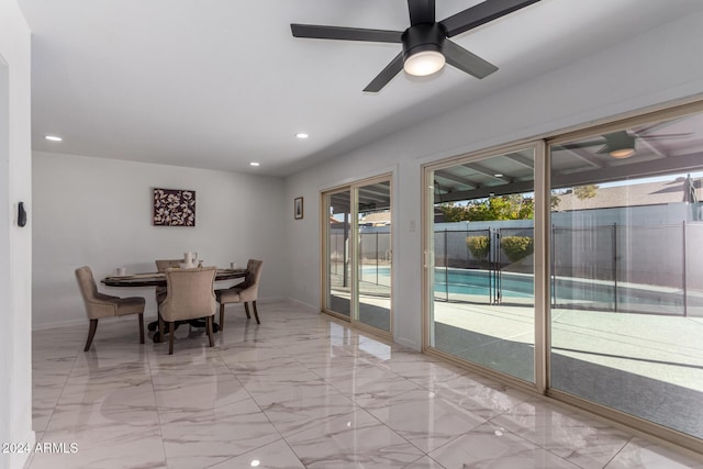 dining area with ceiling fan