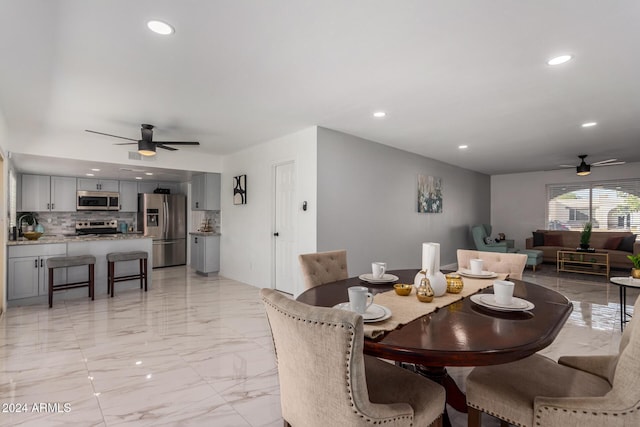 dining area featuring ceiling fan