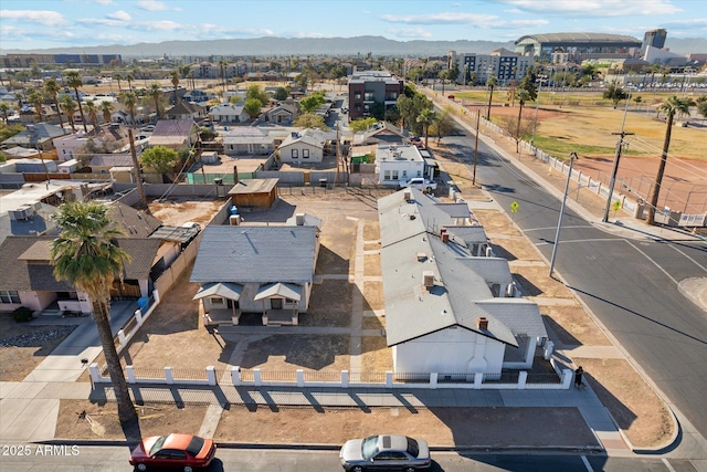 birds eye view of property featuring a mountain view