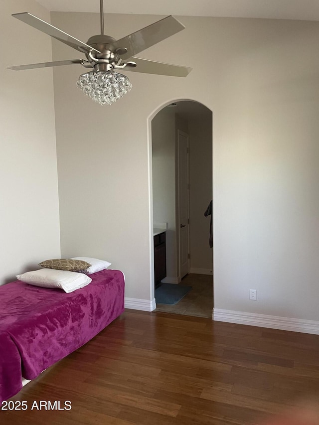 bedroom featuring ceiling fan and dark hardwood / wood-style floors