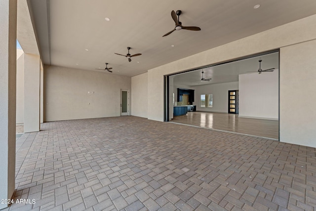 interior space featuring ceiling fan