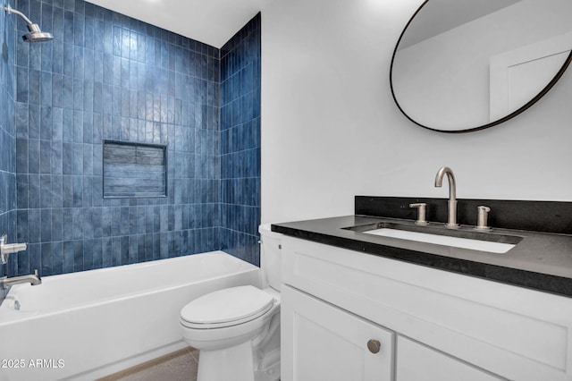 bathroom with toilet, vanity, and bathtub / shower combination