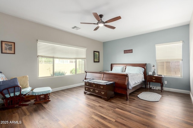 bedroom with hardwood / wood-style floors and ceiling fan