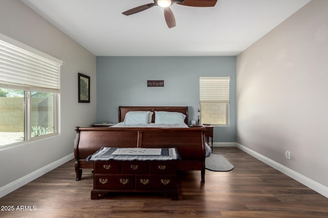 bedroom featuring ceiling fan and dark hardwood / wood-style floors