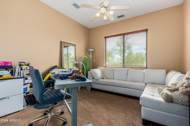 office featuring carpet flooring, visible vents, and ceiling fan