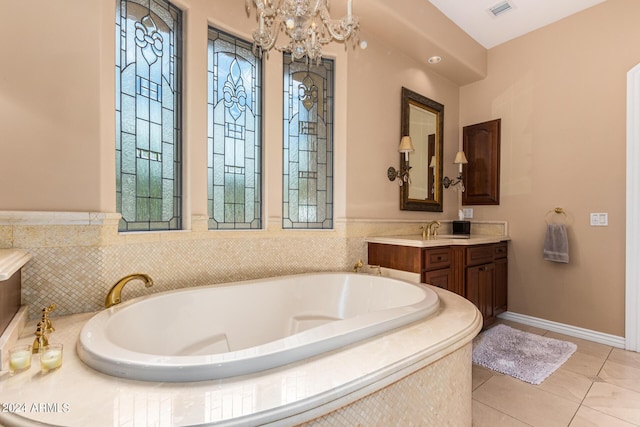 full bathroom with tile patterned floors, visible vents, vanity, and a garden tub