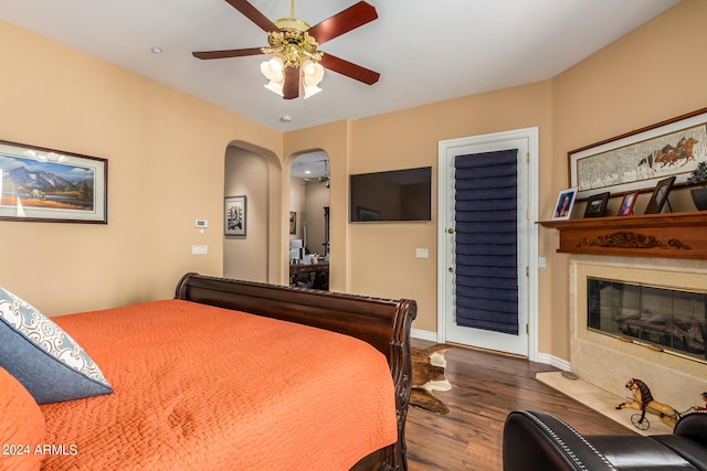 bedroom with wood-type flooring and ceiling fan