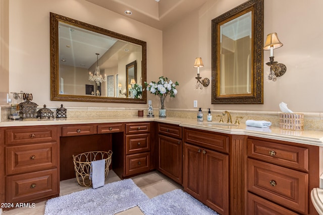 bathroom with tile patterned flooring and dual bowl vanity