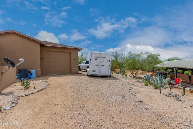 exterior space featuring a garage