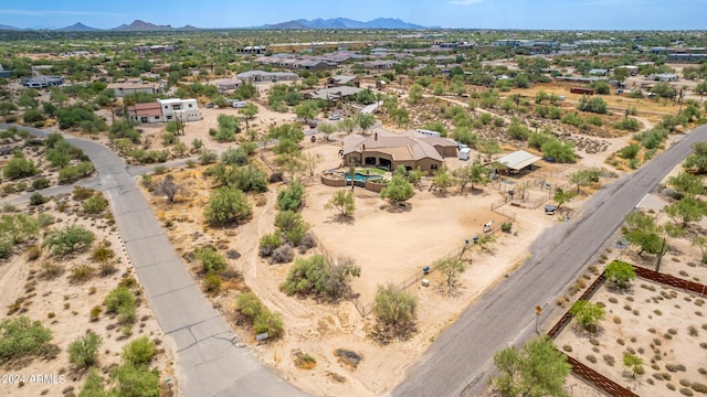 bird's eye view with a mountain view and a desert view