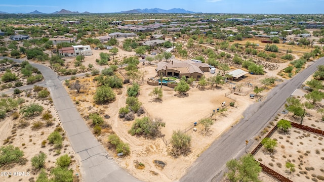 drone / aerial view featuring a mountain view