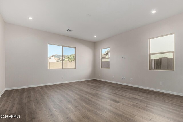 unfurnished room featuring light wood-type flooring