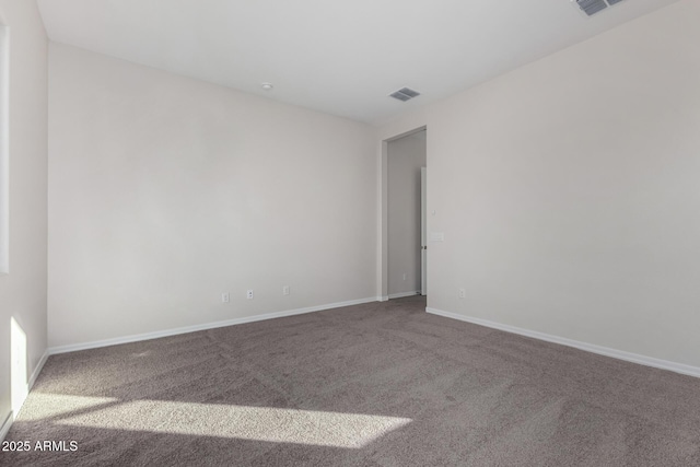 view of carpeted spare room