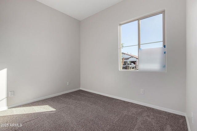 unfurnished room with carpet