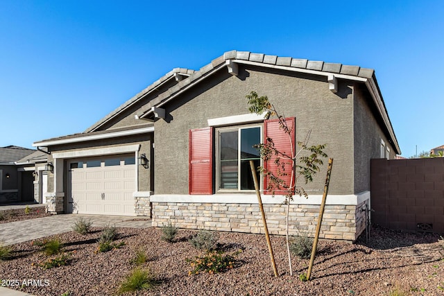 view of front of property with a garage