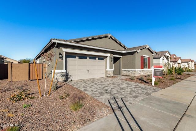 single story home featuring a garage