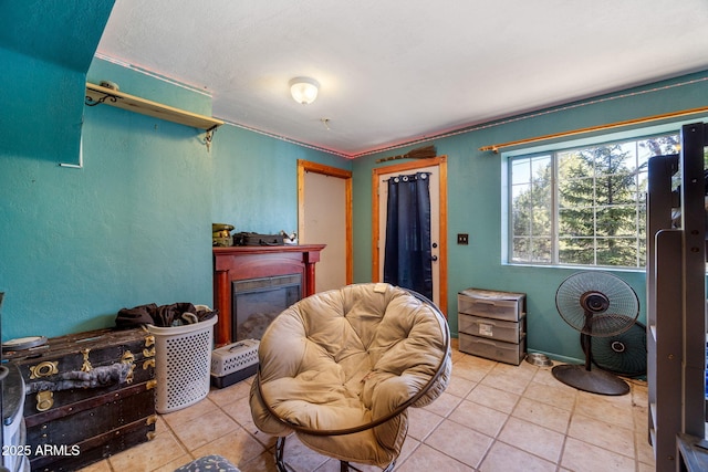 1326 W Apache Ln, Pinetop-Lakeside, AZ 85929 - sitting room with tile patterned flooring and a glass covered fireplace