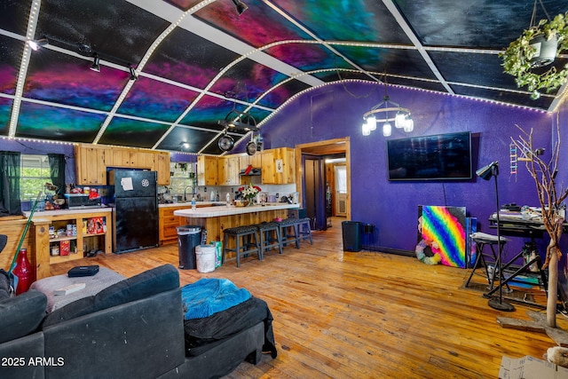 1326 W Apache Ln, Pinetop-Lakeside, AZ 85929 - living room featuring vaulted ceiling and light wood-style floors