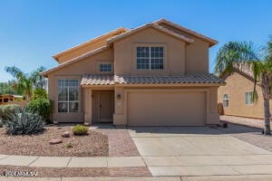 view of front of house with a garage