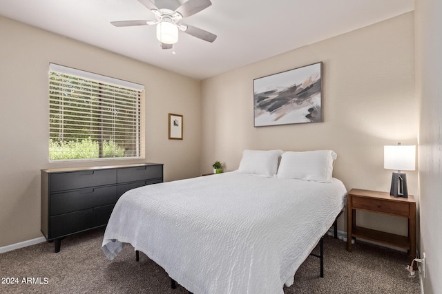 bedroom with carpet flooring, baseboards, and ceiling fan