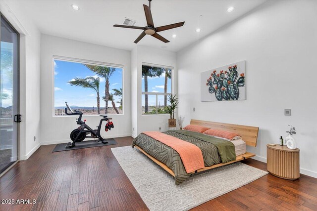 bedroom featuring recessed lighting, visible vents, baseboards, and hardwood / wood-style flooring