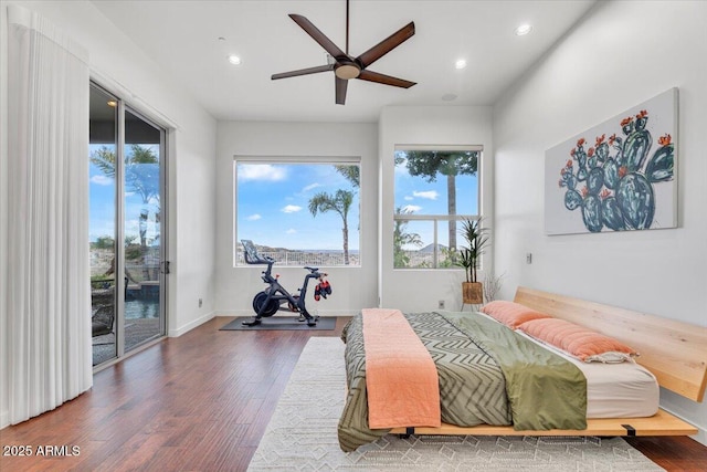 bedroom with ceiling fan, baseboards, recessed lighting, wood finished floors, and access to outside