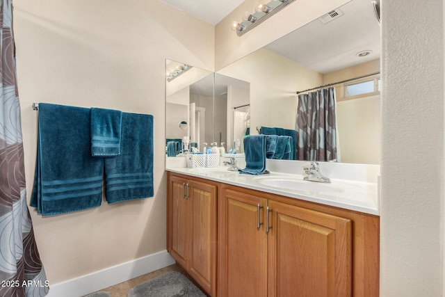 bathroom featuring vanity and tile patterned floors