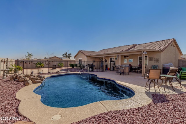 view of pool with a patio