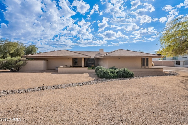 view of front of property featuring a patio