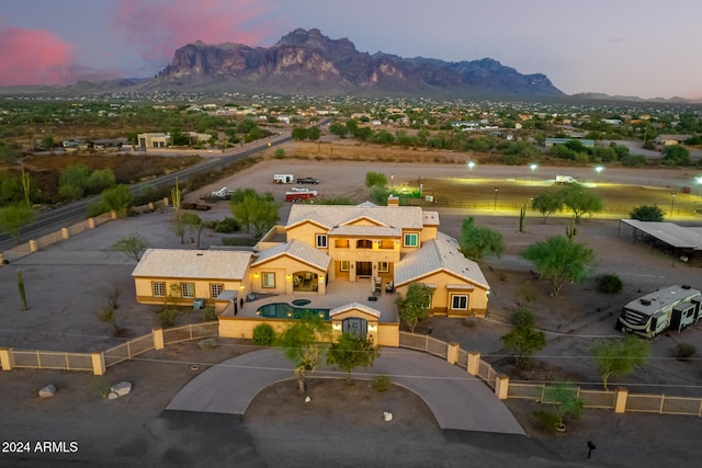 aerial view at dusk with a mountain view