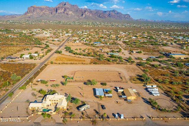 birds eye view of property featuring a mountain view