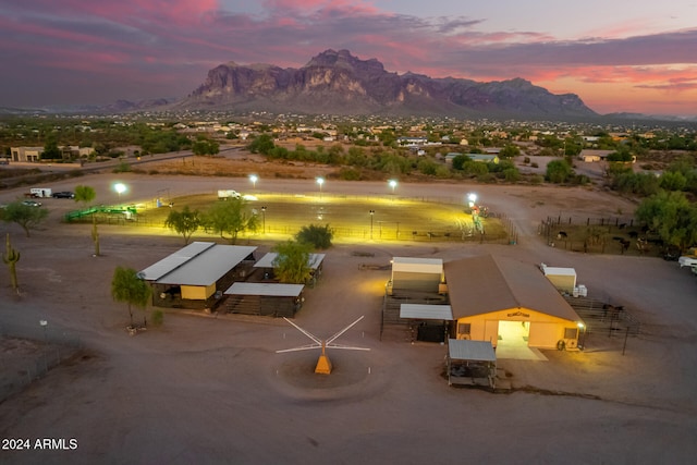 view of home's community with an outdoor structure and a mountain view