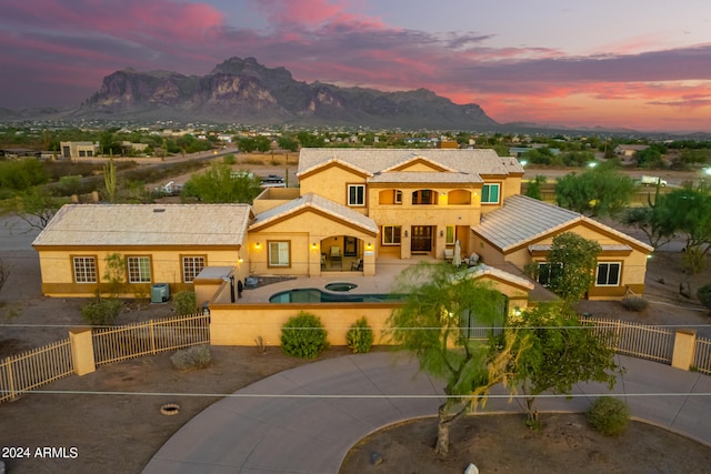 view of front of home featuring a mountain view